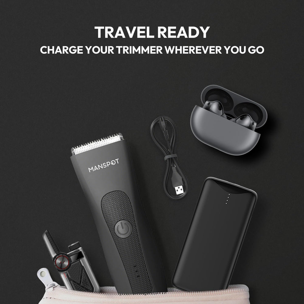 MANSPOT HC-W003A trimmer with B-port charger cable in a travel grooming kit