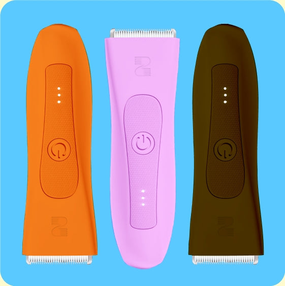 Orange, pink and black SPOTMATE body trimmers for grooming routines