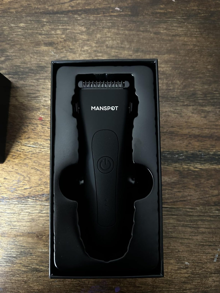 Customer photo of black MANSPOT body trimmer in its box